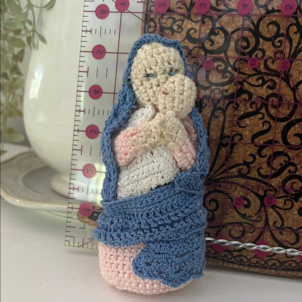 Crocheted Figurine with Blue and Pink Details